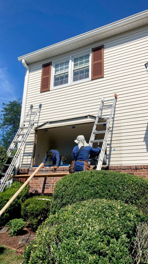 The RJW Exteriors team changes a bay window in a customer’s home