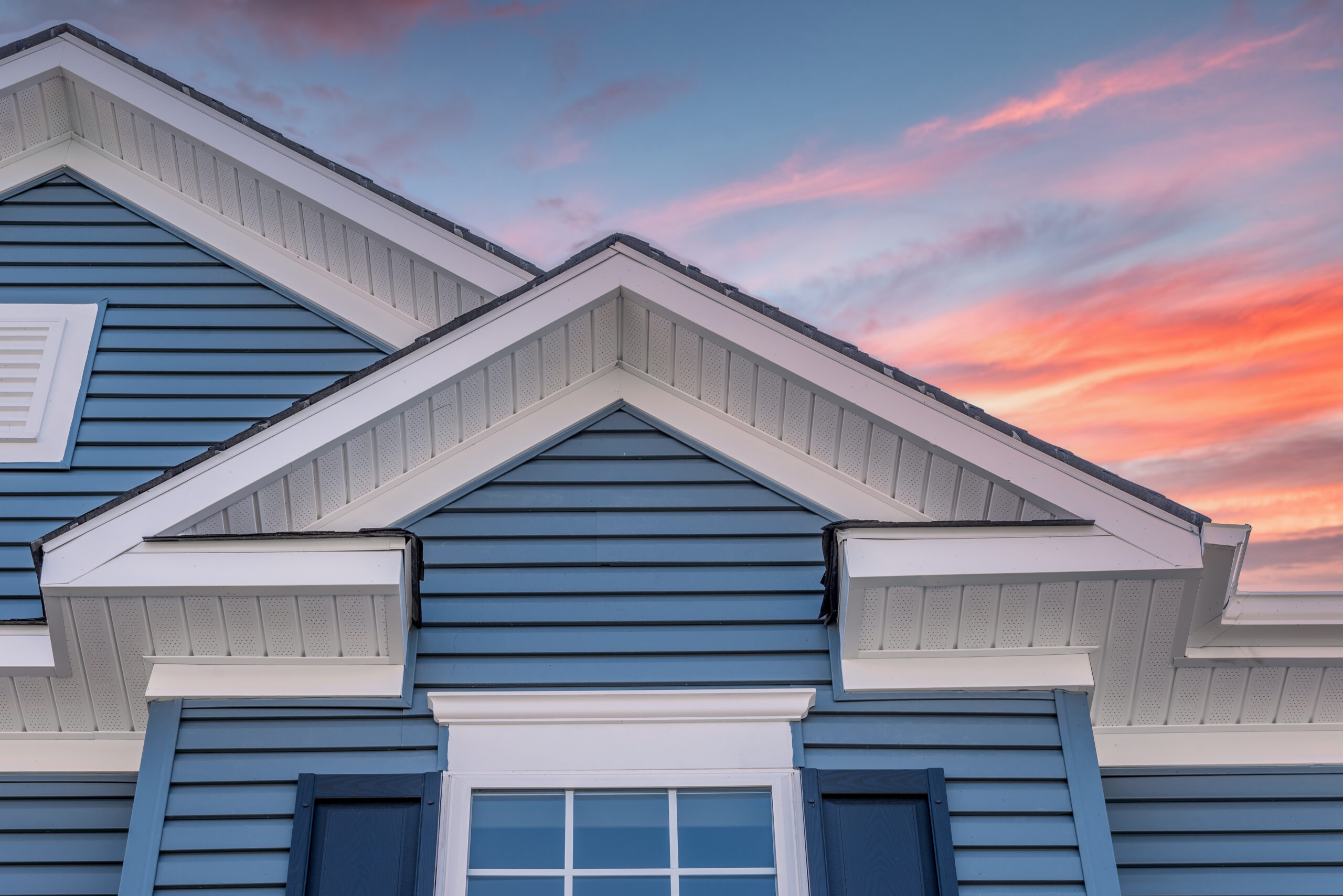 Home with blue siding installed