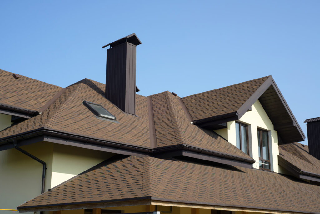 There is a fresh brown roof on the home