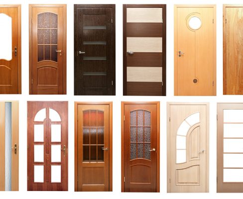 A varied selection of entry door options laid out in two long rows